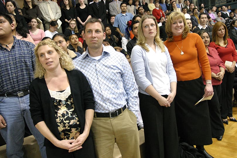 (L-r) Sarah Thomas, a candidate, stands with her husband and sponsor Jim, who is standing next to his sister Elizabeth Earl, another candidate, and her sponsor Elizabeth Fien. The four are from Prince of Peace Church, Buford. Photo by Michael Alexander