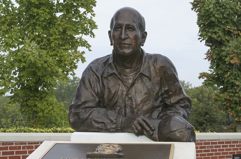 A bust of legendary football coach George Maloof is displayed in front of the stadium at St. Pius X High School, Atlanta, that is named after him. George Maloof served as a mentor to many of today's coaches like the ones that go by the name of Azar, Maloof, Standard and Turner. Photo By Michael Alexander