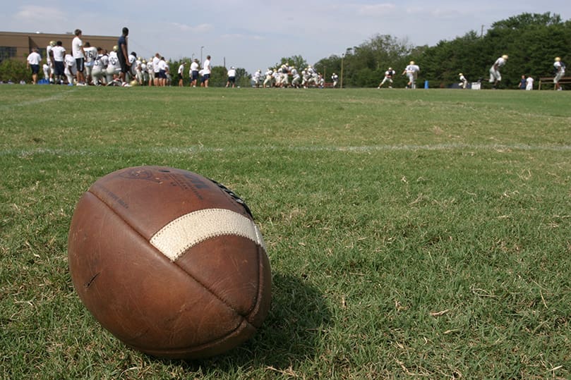 A football rests on the side of the field during football practice at Dacula High School. Photo By Michael Alexander