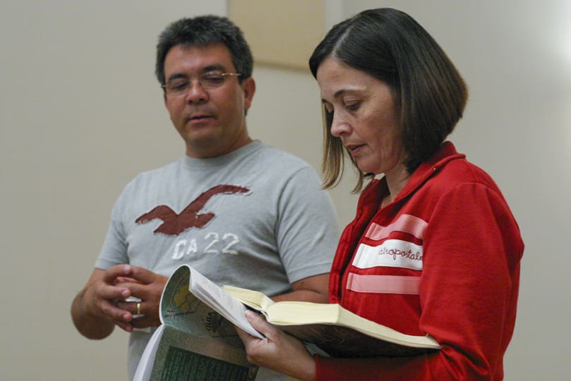 Eddie, left, and Evanir Galvao facilitate the family prayer meeting at St. Jude the Apostle Church, Atlanta. Some 30 people, mostly couples dialogued and reflected on book of Matthew, chapter 19.Photo By Michael Alexander