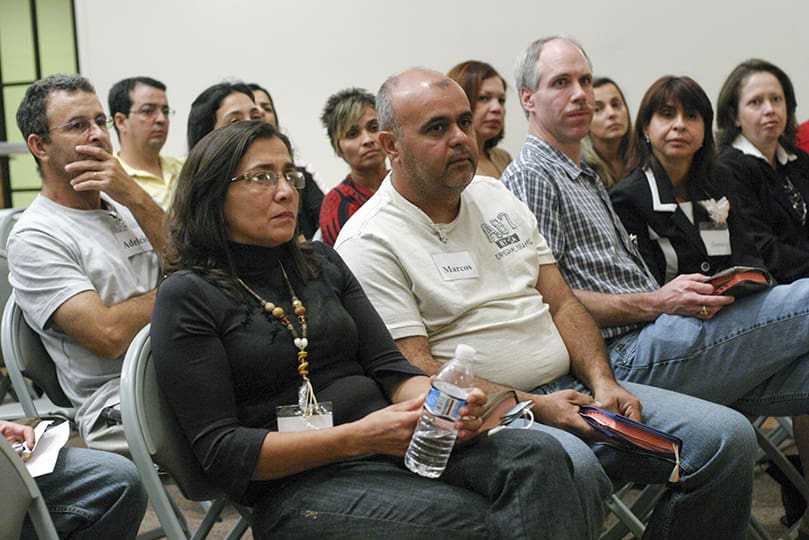Maria Fernandes, front row, left, and her husband Marcos join other couples in prayer and reflection that meet every first and third Thursday of the month at St. Jude the Apostle Church, Atlanta. Photo By Michael Alexander