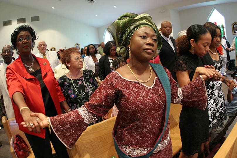 Florence Adu, right center, chaired the 25th anniversary steering committee for Christ Our Hope Church, Lithonia. The parish celebrated its two and a half decades with a special liturgy and celebration, Aug. 30. Photo By Michael Alexander