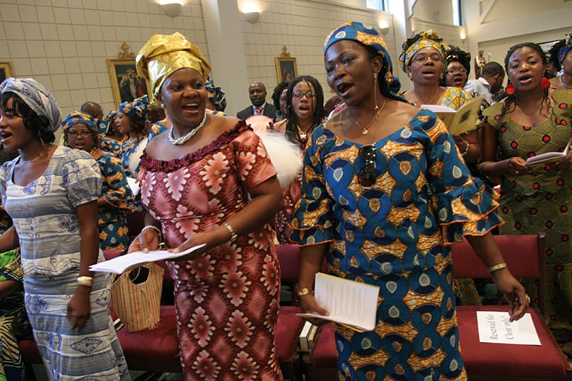 Catholic women of Cameroon decent from around the Archdiocese of Atlanta come together to make beautiful music for their monthly Mass. Photo By Michael Alexander