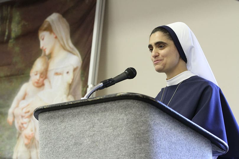 Sisters of Life Sister Mariam Caritas of New York addresses the females attending the Oct. 15 Saved In Hope Retreat.