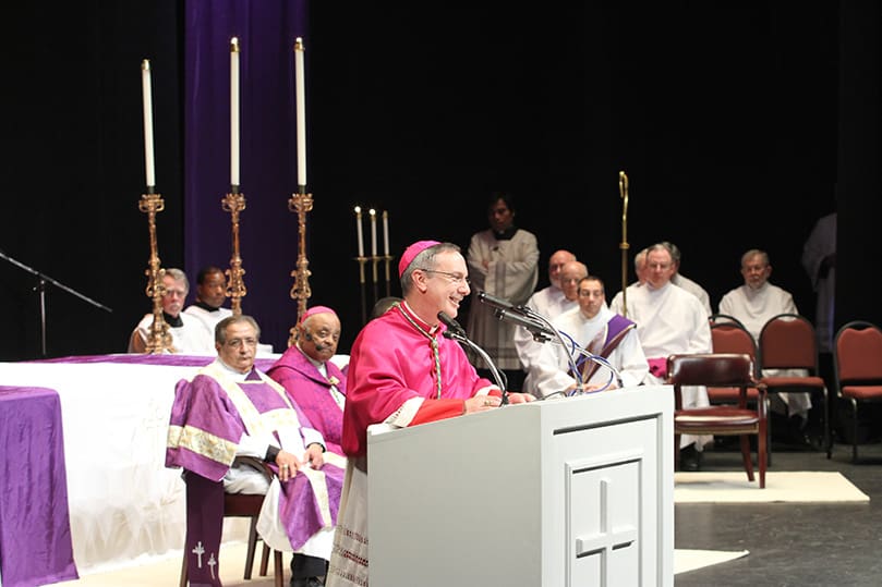 Bishop Luis Zarama, Auxiliary Bishop of Atlanta, addresses the congregation in Spanish after Archbishop Wilton D. Gregory spoke to them in English. Photo By Michael Alexander
