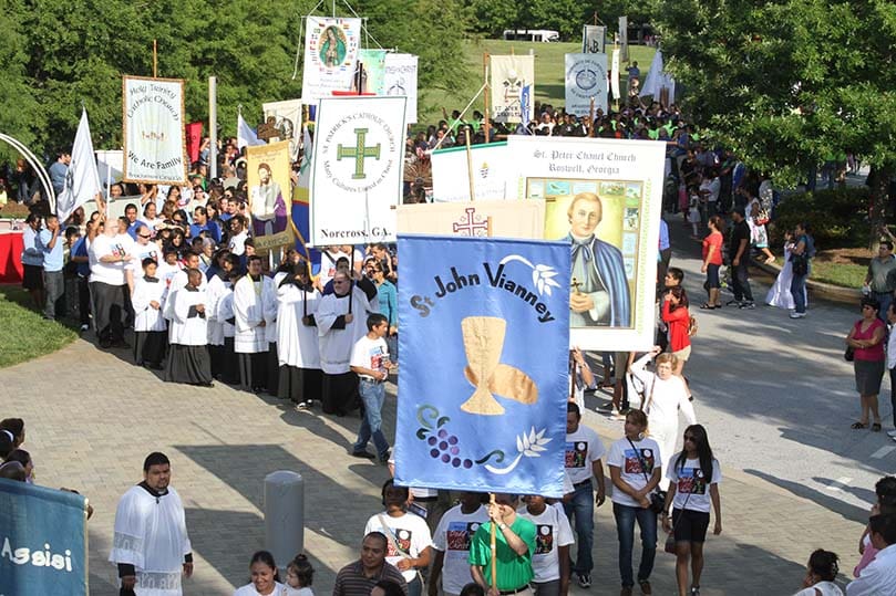 Thousands of Eucharistic Congress participants gather for the morning procession in front of the Georgia International Convention Center, College Park, June 9. Photo By Michael Alexander
