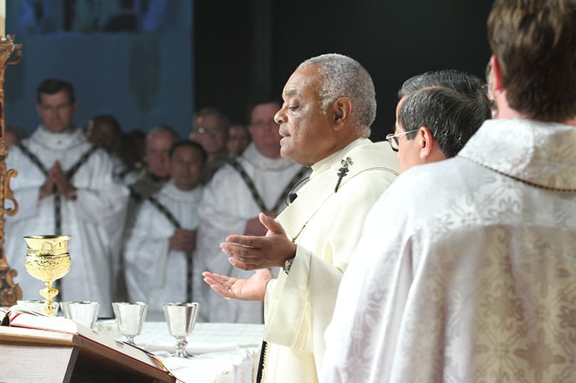 Archbishop Wilton D. Gregory leads a prayer during the Liturgy of the Eucharist as the closing Mass marks an end to the Archdiocese of Atlanta’s 17th annual Eucharistic Congress. Photo By Michael Alexander