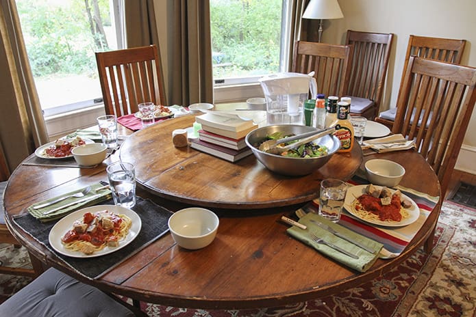 The table is set for a family style meal at the L'Arche Atlanta home in Decatur. Photo By Michael Alexander