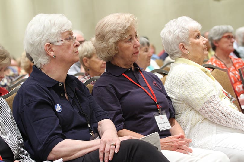 (L-r) Trish Johnston, Margaret McManus and Pat Joyce served as volunteers for the host committee from St. Jude the Apostle Church, Sandy Springs. Photo By Michael Alexander
