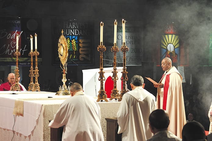 Archbishop Wilton D. Gregory leads adoration, exposition and Benediction of the Blessed Sacrament during the second day of the 18th annual Eucharistic Congress. Photo by Michael Alexander