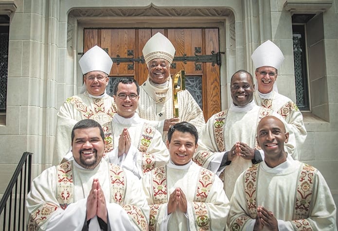 Archbishop Wilton D. Gregory ordained five men as transitional deacons on May 25 at the Cathedral of Christ the King, Atlanta. Shown are: (back row, l-r) Bishop David P. Talley, Archbishop Gregory and Bishop Luis R. Zarama; (middle row, l-r) Rev. Mr. Brian Baker and Rev. Mr. Junot Nelvy; (front row, l-r) Rev. Mr. Luis Alvarez, Rev. Mr. Rey Pineda and Rev. Mr. Desmond Drummer. (Photos by Thomas Spink/Archdiocese of Atlanta)