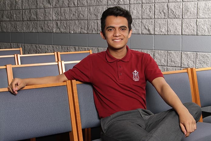 Our Lady of Mercy High School senior Essai Flores will attend New York University. Flores participated in a number of extracurricular activities during high school, but he distinguishes himself as the first person in his family to attend college. Photo By Michael Alexander