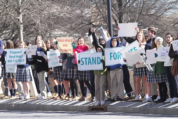 Over 100 students from St. Joseph School and The Overbrook School, Nashville, Tenn., St. Mary’s School, Oakridge, Tenn., and St. Catherine of Siena School, Kennesaw, stood along Peachtree Road, in front of Lenox Square Shopping Center, during the Jan. 22 Stand for Life. Photo By Michael Alexander