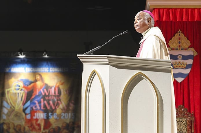 Archbishop Wilton D. Gregory gives some opening remarks to the vast congregation on hand for the 20th Annual Eucharistic Congress at the Georgia International Convention Center, College Park. Photo By Michael Alexander