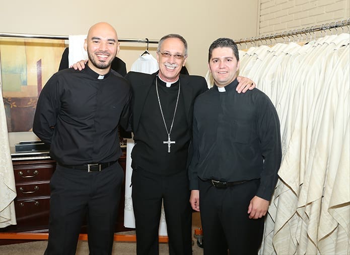 Like Atlanta Auxiliary Bishop Luis Rafael Zarama, center, two of the three transitional diaconate ordination candidates, Carlos Cifuentes, left, and Roberto SuÃ¡rez Barbosa, right, hail from Colombia, South America. Photo By Michael Alexander