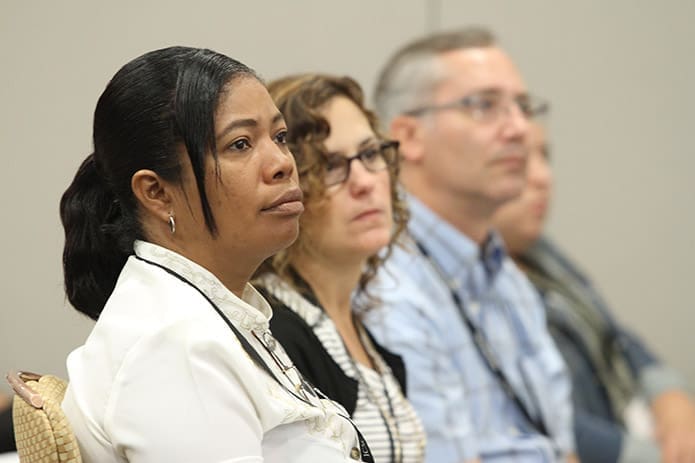 (Foreground to background) Roxanne Douglas of the Diocese of Georgetown in Guyana, Karen Brown of St. Gabriel Church, Charlotte, N.C., and Dan Jakl of St. Lawrence Church, Lawrenceville, attend one of the workshops in the diocesan-related foundations track. Photo By Michael Alexander