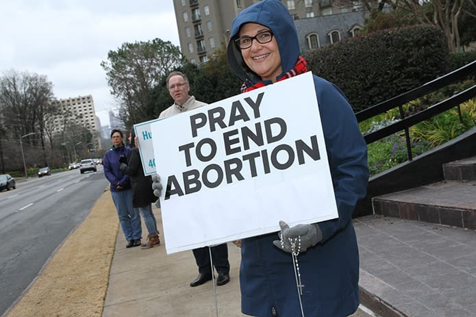 Mary Clauson of St. Jude the Apostle Church, Sandy Springs, makes a public request as she stands with others during the 2017 Stand for Life. Photo By Michael Alexander