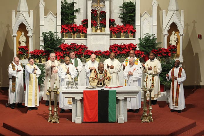 Joined by his brother clergy around the altar, Archbishop Wilton D. Gregory served as the homilist and principal celebrant for the Jan. 14 Martin Luther King Jr. Eucharistic Celebration at the Shrine of the Immaculate Conception, Atlanta. Photo By Michael Alexander