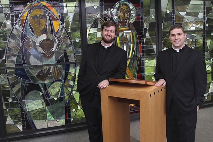 The year’s new priests for the Archdiocese of Atlanta include Father Bradley Starr, left, and Father Bryan Kuhr. They were ordained to the priesthood by Archbishop Wilton D. Gregory on June 24 at the Cathedral of Christ the King, Atlanta. Photo By Michael Alexander