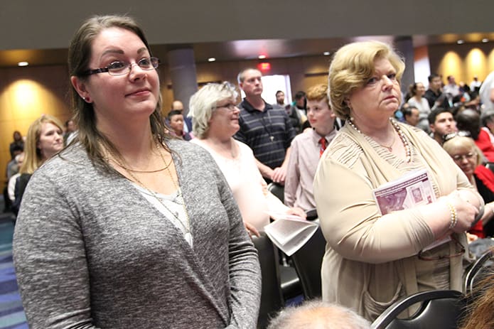 Amanda Garcia, left, a candidate from St. Matthew Church, Tyrone, stands with her loving and protective sponsor Bonnie Kaplan during the March 5 Rite of Election and the Call to Continuing Conversion. Photo By Michael Alexander