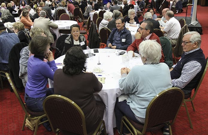 After the evening’s speakers weighed in, over 200 people of different faiths and backgrounds had a chance to discuss the things that unite each other. "Repairing the World" was held Oct. 25. Photo By Michael Alexander