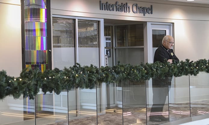 Deacon Whitney Robichaux, ordained in 1987, is currently assigned to the Cathedral of Christ the King, Atlanta. Over the years Deacon Robichaux has served in various ministerial roles, including a chaplain at Hartsfield-Jackson Atlanta International Airport, as indicated by this file photo. Photo By Michael Alexander