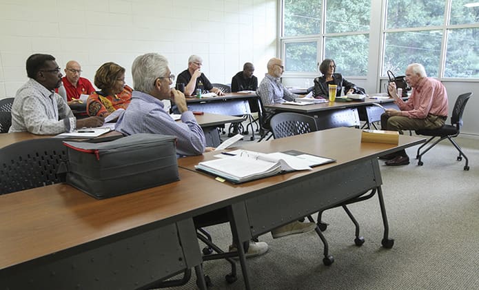 David Donahue, sitting far right, teaches the Christology and Trinity class for 2021 diaconate candidates and their wives. The formation classes take place at the St. Stephen Center for Diaconal Studies in southwest Atlanta. Photo By Michael Alexander