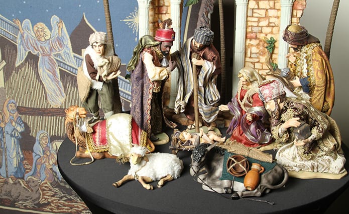 Marcy Borkowski-Glass indicated that the crèche in the foreground is over 13-years-old. In the background to the left is an afghan blanket nativity scene. Photo By Michael Alexander