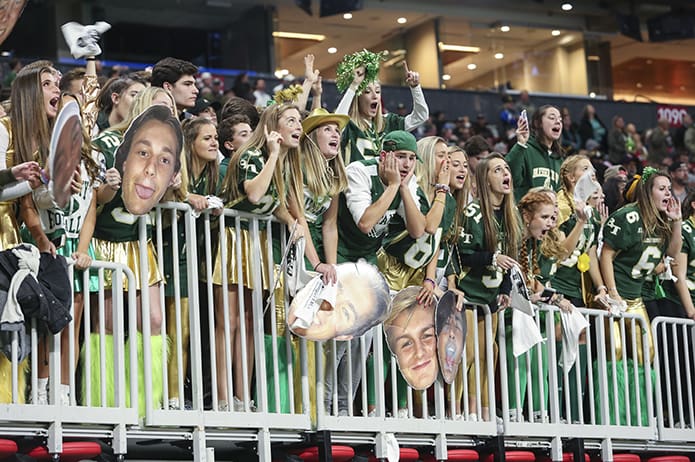 Fans in the Blessed Trinity High School student section can feel another victory coming on as the game clock winds down. Their team won its second consecutive state championship, Dec. 12, with a 23-9 win over Cartersville High School. Blessed Trinity also finished the season with a perfect 15-0 record. Photo By Michael Alexander