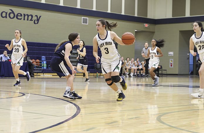 Notre Dame Academy guard Josie Fleck (#3) attacks the defense during the first period of the teamâs Jan. 31 game against Brandon Hall School, Atlanta. Notre Dame rolled to victory by a score of 48-10. Photo By Michael Alexander