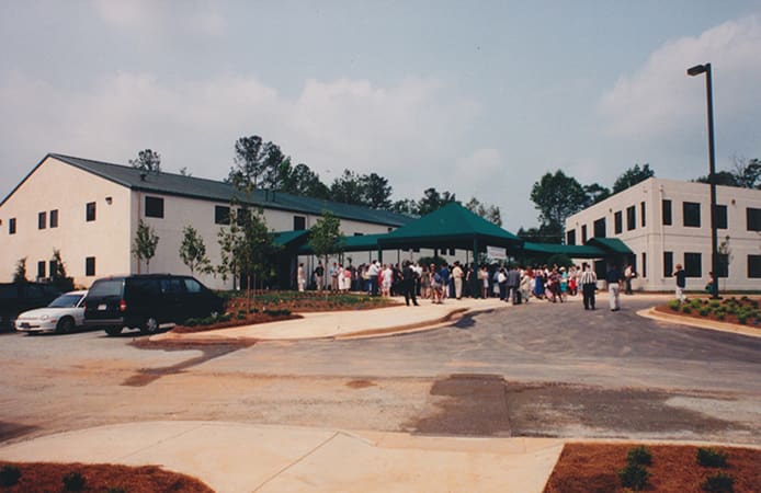 This image was captured on May 24, 1998 when the old Mary Our Queen Church, the building on the left, was dedicated. This old worship space will now serve as the parish hall. Photo By Rick Taylor