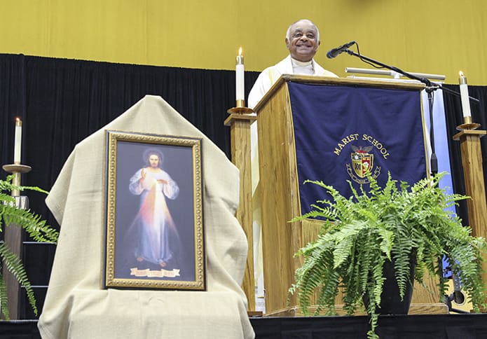 Archbishop Wilton D. Gregory was the main celebrant and homilist at his April 28 farewell Mass. He asked the congregation to remember him and his new faith family in Washington, D.C. for their prayers. The Mass took place on the second Sunday of Easter at Marist School’s Centennial Center. Photo By Michael Alexander