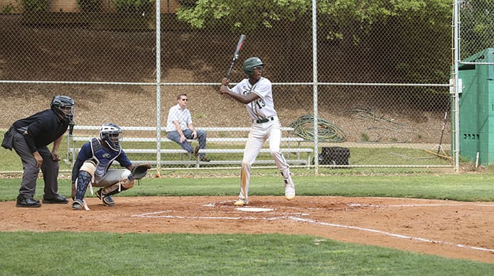 In addition to relief pitching and playing short stop for Holy Spirit Prep, Terrance Parker (#13) had seven RBIs on three hits. He drove in runs on a single in the third inning, a double in the fourth, and a home run in the fifth. Photo By Michael Alexander