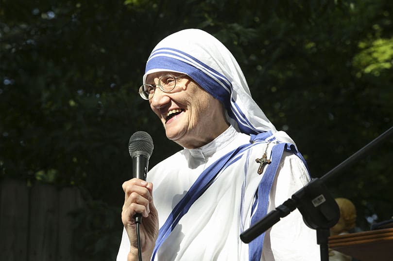 Sister Mary Prema, MC, superior general of the Missionaries of Charity since 2009, briefly addresses the congregation before the final blessing of the June 29 Mass at Gift of Grace House, Atlanta. Photo By Michael Alexander