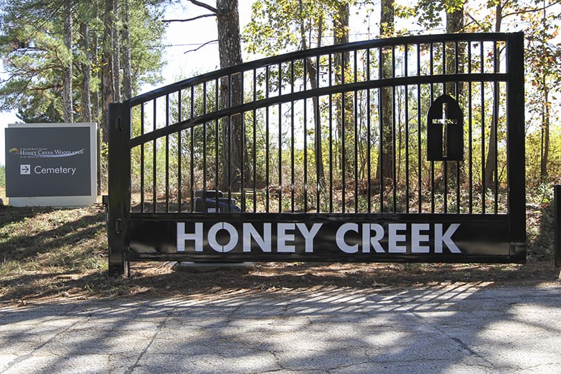 Honey Creek Woodlands didn't always have nice gate to mark its entrance. The motorized gate you drive by today was donated by Mark Hoffman, state deputy of the Georgia Knights of Columbus. It was installed by Starfire Automatic Gates and Security of Jackson. Photo By Michael Alexander
