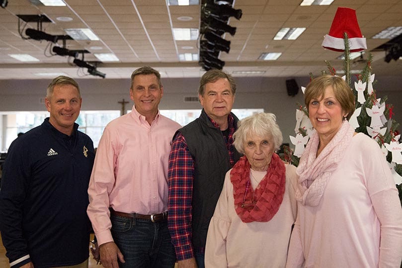 Bob Buechner's widow, June, second from right, is joined by four of her seven children. They include (l-r) Rob Jr., Michael, David, and Laura Buechner Holmes. Not pictured are Linda Buechner Kelly, Thomas Buechner and Christopher Buechner. The most recent Bob Buechner Blood Drive marked its 10th anniversary at Holy Cross Church, Atlanta. Photo Courtesy of Rob Buechner