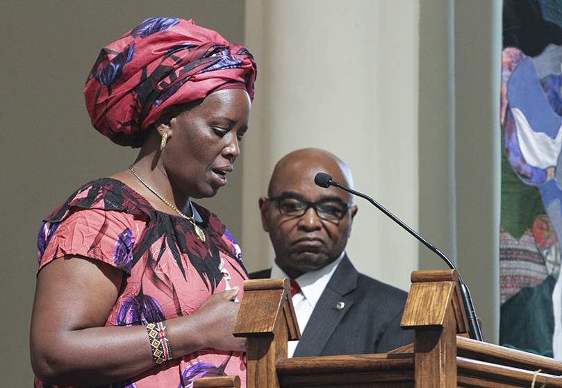 Mary Wambugu was one of 11 multicultural participants who vocalized the prayers of the faithful in their native language. Wambugu, a member of St. Francis of Assisi Church, Cartersville, spoke in Swahili. Photo By Michael Alexander
