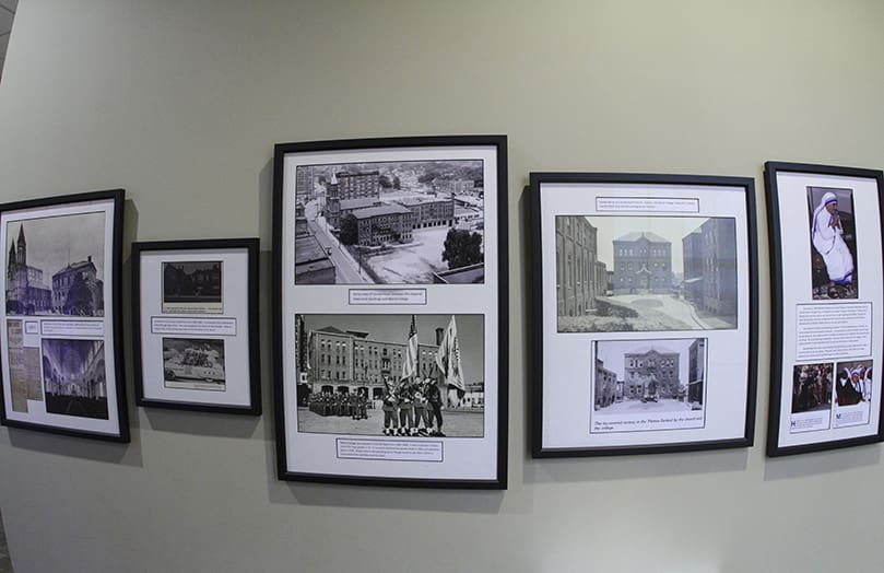 In the lower level of the church, just outside the O'Hagan Parish Hall, there is a space that displays some archival photos and highlights some historical moments in the church. Photo By Michael Alexander