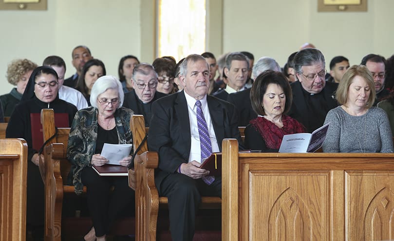 At the Feb. 29 Rite of Election and the Call to Continuing Conversion, Rite of Christian Initiation of Adults (RCIA) team members from 25 different parishes and missions are seated together in the first three row of pews during the Liturgy of the Word. Photo By Michael Alexander