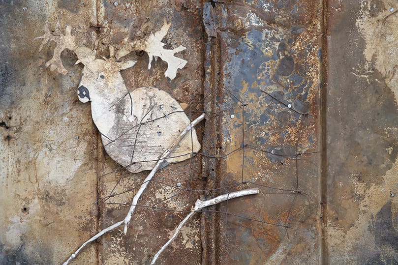 This mixed media piece entitled, “Once Something Has Lived It Can Never Really Die,” is the work of the late artist Ronald Lockett. It is connected to the reflection, written by Our Lady of Mercy High School theology chair, Franck Launay-Fallasse, for Station Fourteen at the High Museum, Jesus is Placed in the Tomb. Photo By Michael Alexander