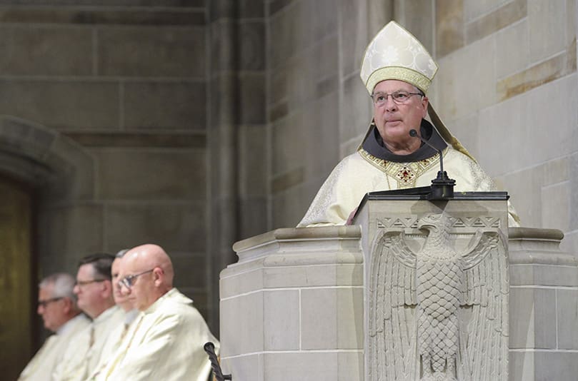 Archbishop Gregory J. Hartmayer, OFM Conv., delivers his first Chrism Mass homily, as the archbishop of Atlanta, August 17, at the Cathedral of Christ the King, Atlanta. The Chrism Mass usually takes place on the Tuesday of Holy Week, but with the outbreak of the coronavirus, it was moved from early April to August. Photo By Michael Alexander