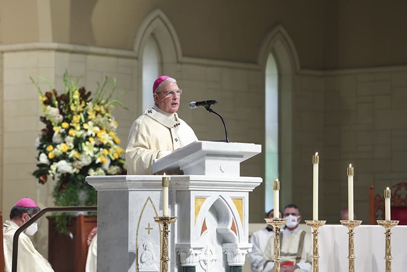 Wearing his sacred pallium, Archbishop Gregory J. Hartmayer, OFM Conv., provides some closing remarks prior to the final blessing and procession. Photo By Michael Alexander