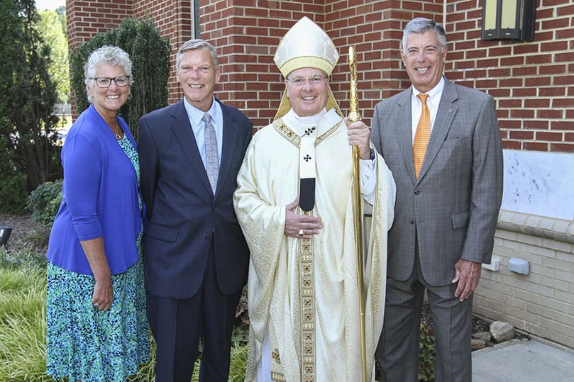Archbishop Gregory J. Hartmayer, OFM Conv., posed for photos after the special Mass with family, friends and a host of others from around the archdiocese. In this photo, he is pictured with (l-r) his younger sister, Mary Jo Kotacka of Bluffton, South Carolina, his younger brother, John H. Hartmayer of Hamburg, New York, and his older brother, C. Douglas Hartmayer of Clarence, New York. Photo By Michael Alexander