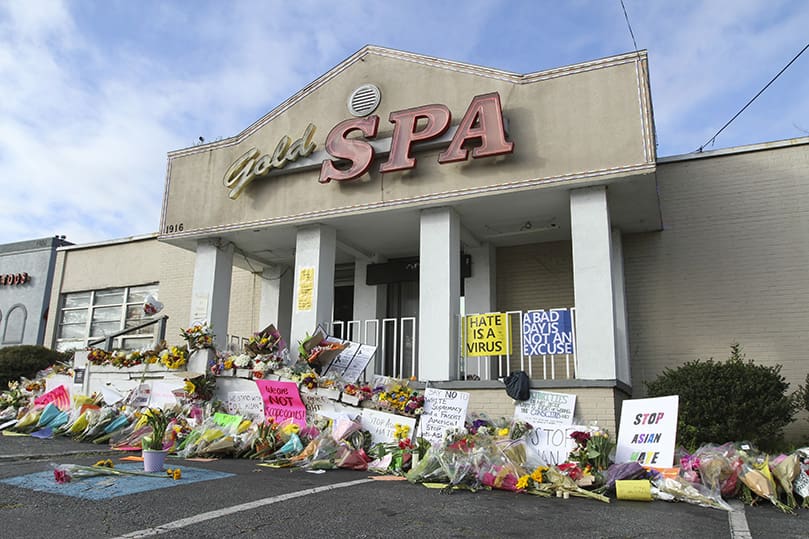 A makeshift memorial at the Gold Spa has grown over the days since the March 16 mass shooting at three Atlanta-area massage parlors. Three of the eight victims perished at the Gold Spa. Photo By Michael Alexander