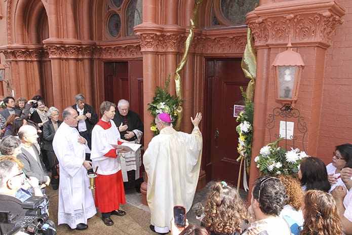 Bishop Luis Zarama conducts a blessing before the Holy Door of Mercy at Sacred Heart of Jesus Basilica, Atlanta, on the Feast of the Presentation of the Lord, Feb. 2. Photo by Michael Alexander