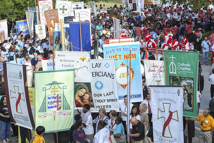 Thousands of Eucharistic Congress participants gather for the morning procession in front of the Georgia International Convention Center, College Park, June 4. Photo By Michael Alexander