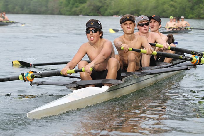 Varsity men’s team members (l-r) Nick Patterson and Granger West, sophomores at Walton High School, Marietta, Charlie Stephens, a sophomore at Roswell High School, Roswell, and Edmund Lynch, sophomore at Walton High School, row in a four shell (four rowers with a coxswain) as they are displaying what is known as sweep rowing (each rower uses one oar). The coxswain for their boat is Morgan Griffin, a sophomore at Roswell high School. Photo By Michael Alexander