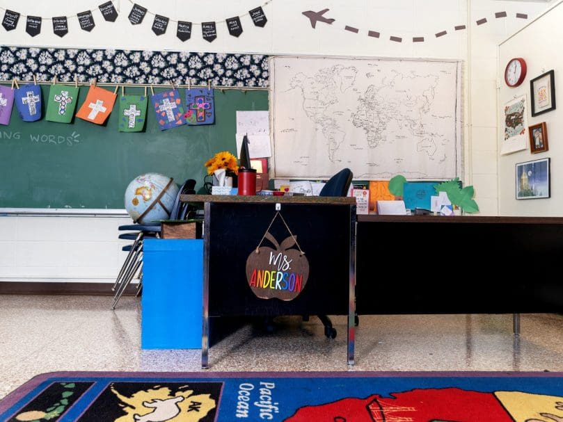 Olivia Anderson’s desk at St. Peter Claver School, where she serves as a teacher in the ACE program. Photo by Johnathon Kelso