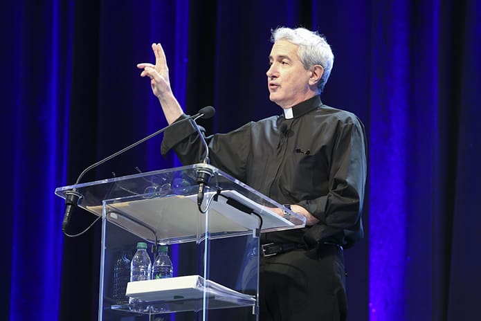 Father Michael White, pastor of Church of the Nativity, Timonium, Md., speaks about the Sunday experience, with particular emphasis on music, the message and ministers. Photo By Michael Alexander