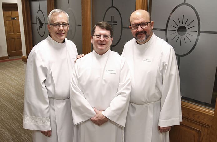 Rarely are there three permanent diaconate candidates from the same parish in a given year, but in 2018 (l-r) Peter Ranft, Richard Hogan and David Schreckenberger, who are from St. Lawrence Church, Lawrenceville, were ordained together. Photo By Michael Alexander